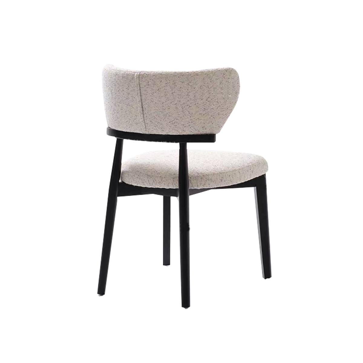 Rear view of dining chair with black frame and grey fabric