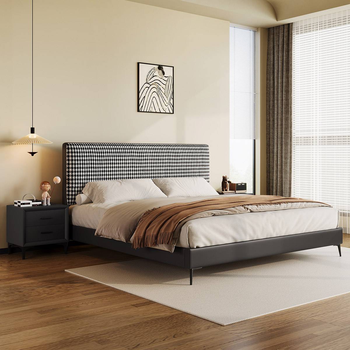 Bedroom scene featuring a bed with a black and white houndstooth headboard and grey leather base