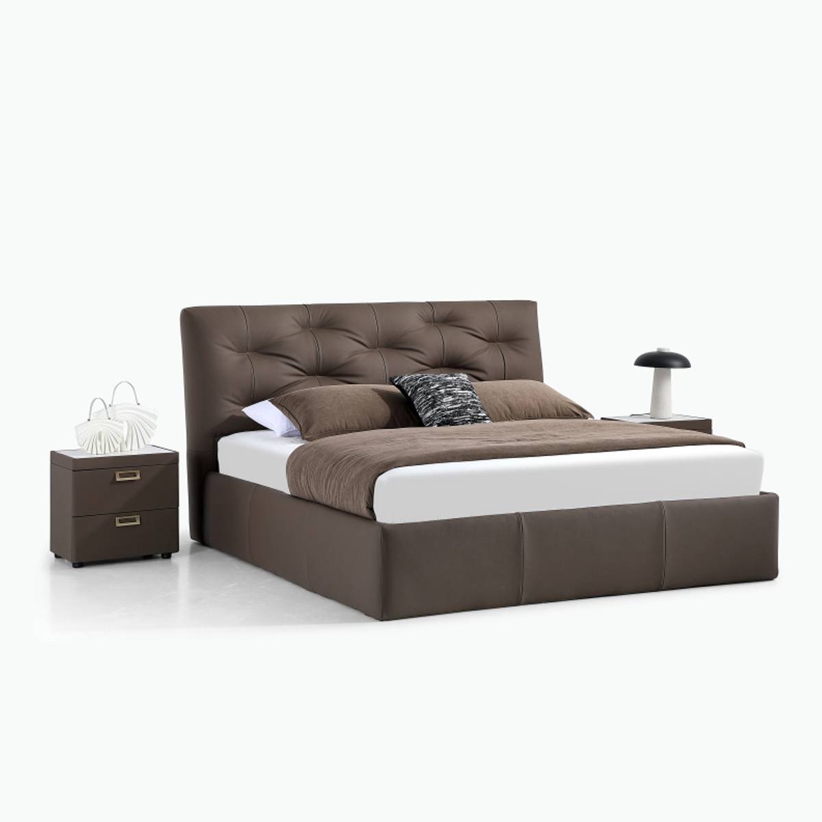 Side angle view of the brown leather bed with white mattress and brown bedding