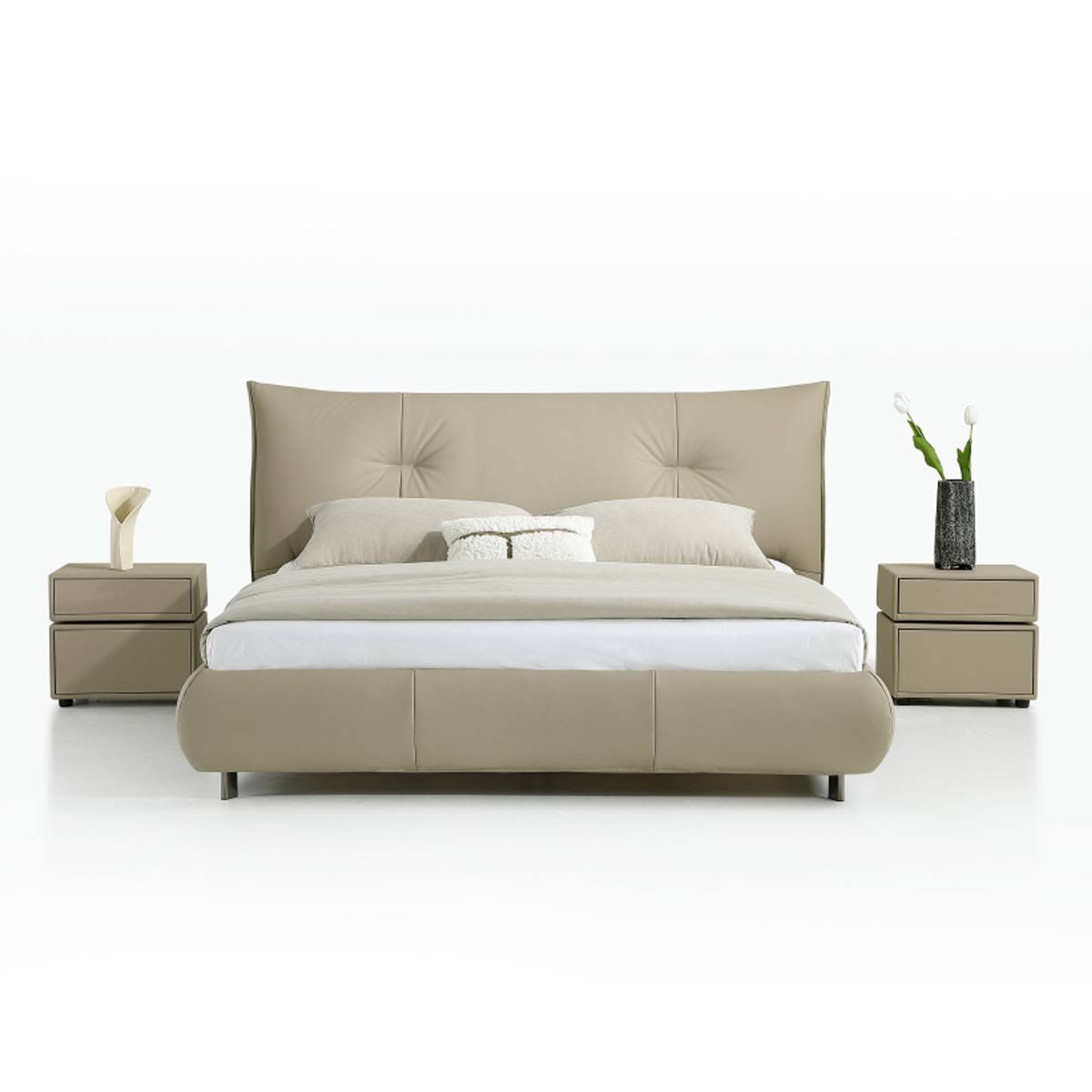 Front view of the beige leather bed showing the tufted headboard details