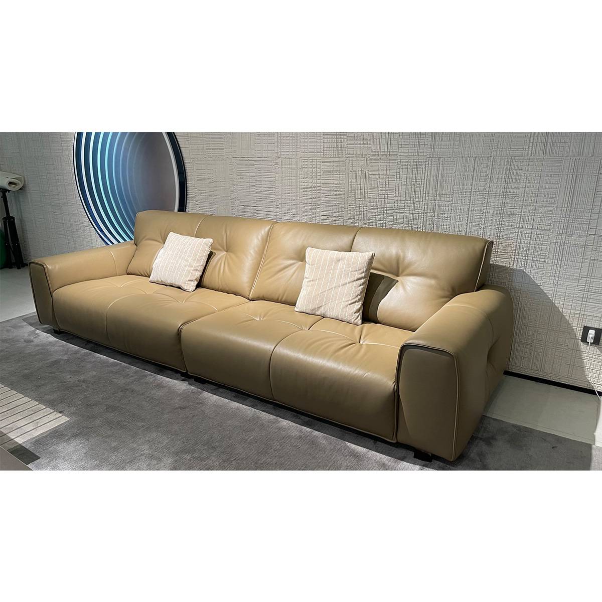 Side angle view of the leather sofa in a showroom setting