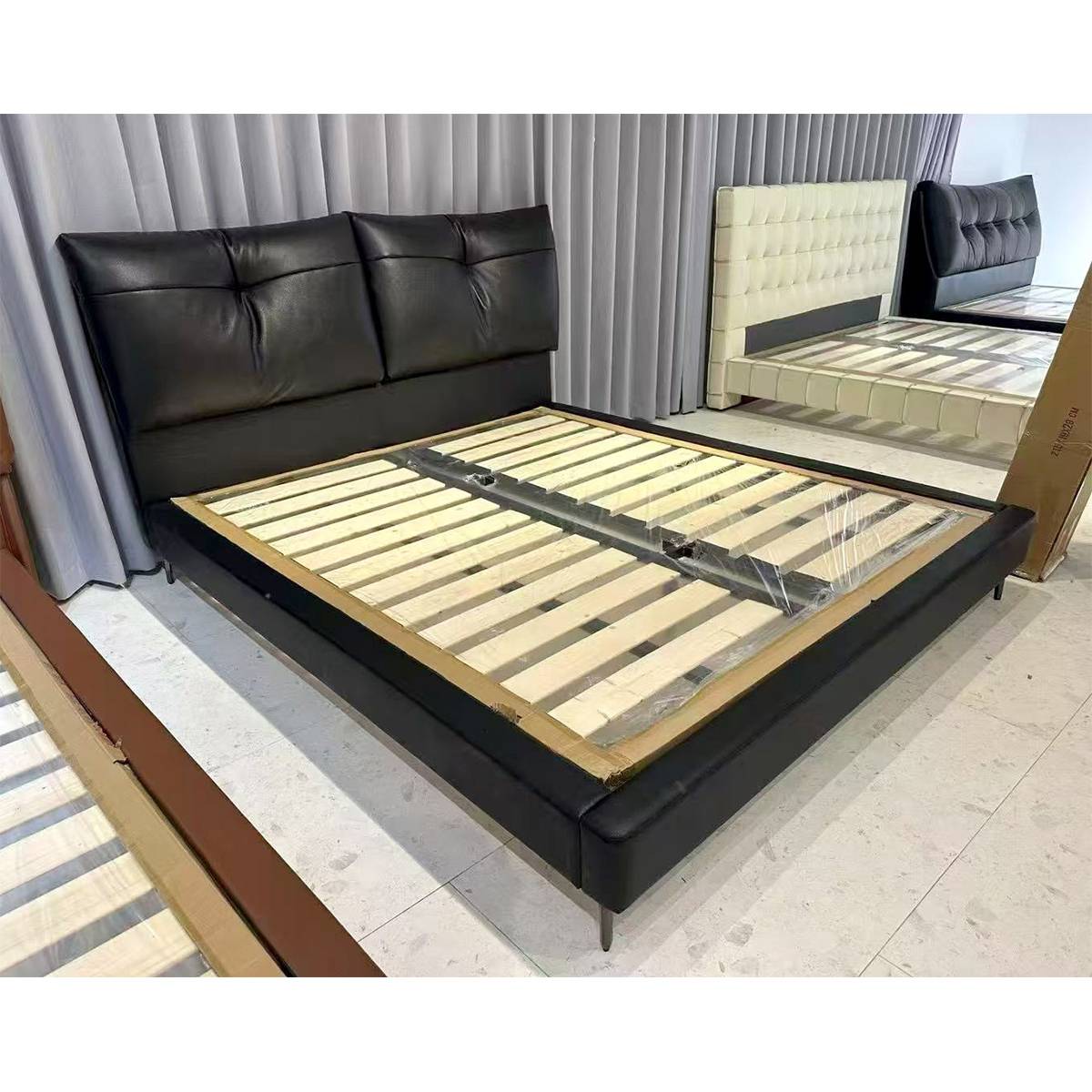 Bed frame showing wooden slat base structure