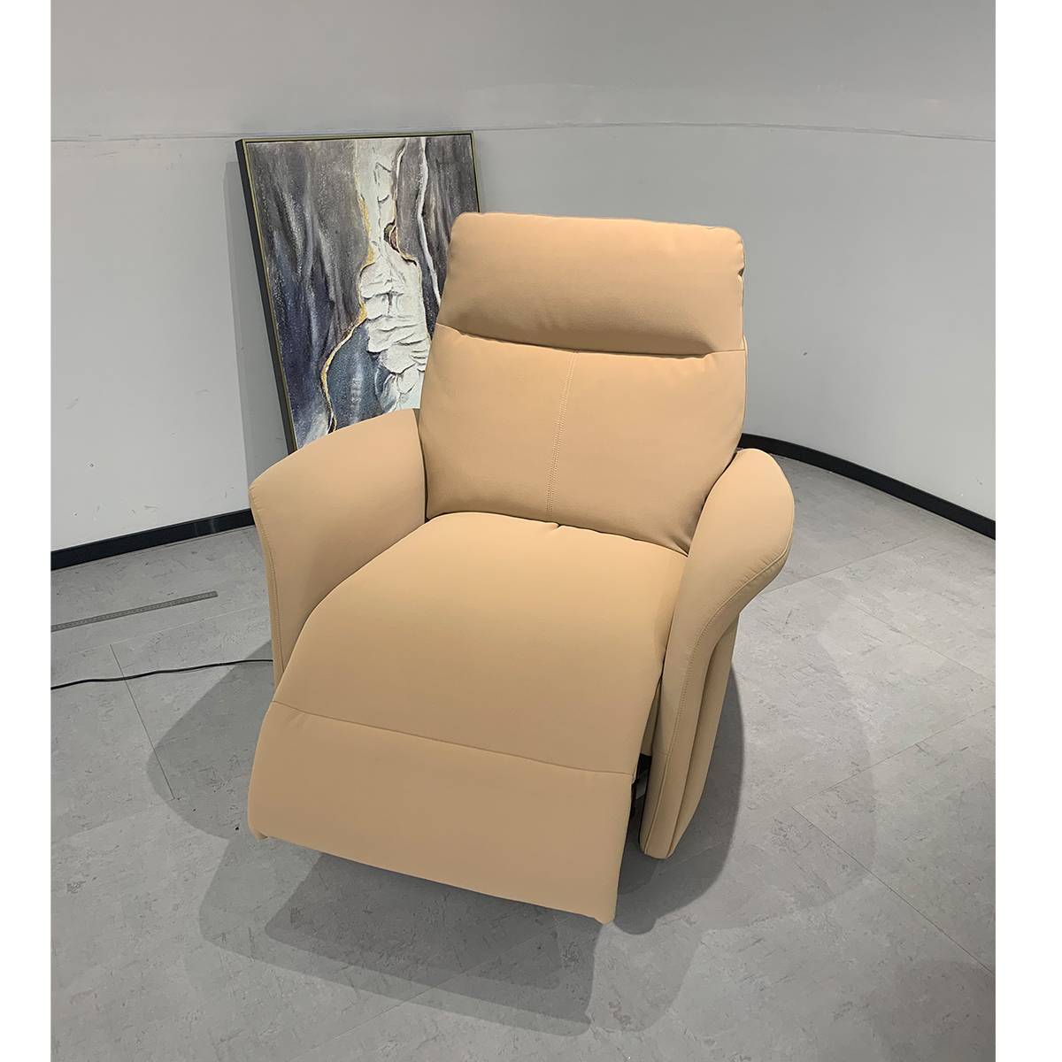 Front view of the beige electric recliner lounge chair in an upright position, highlighting the plush backrest and armrests.