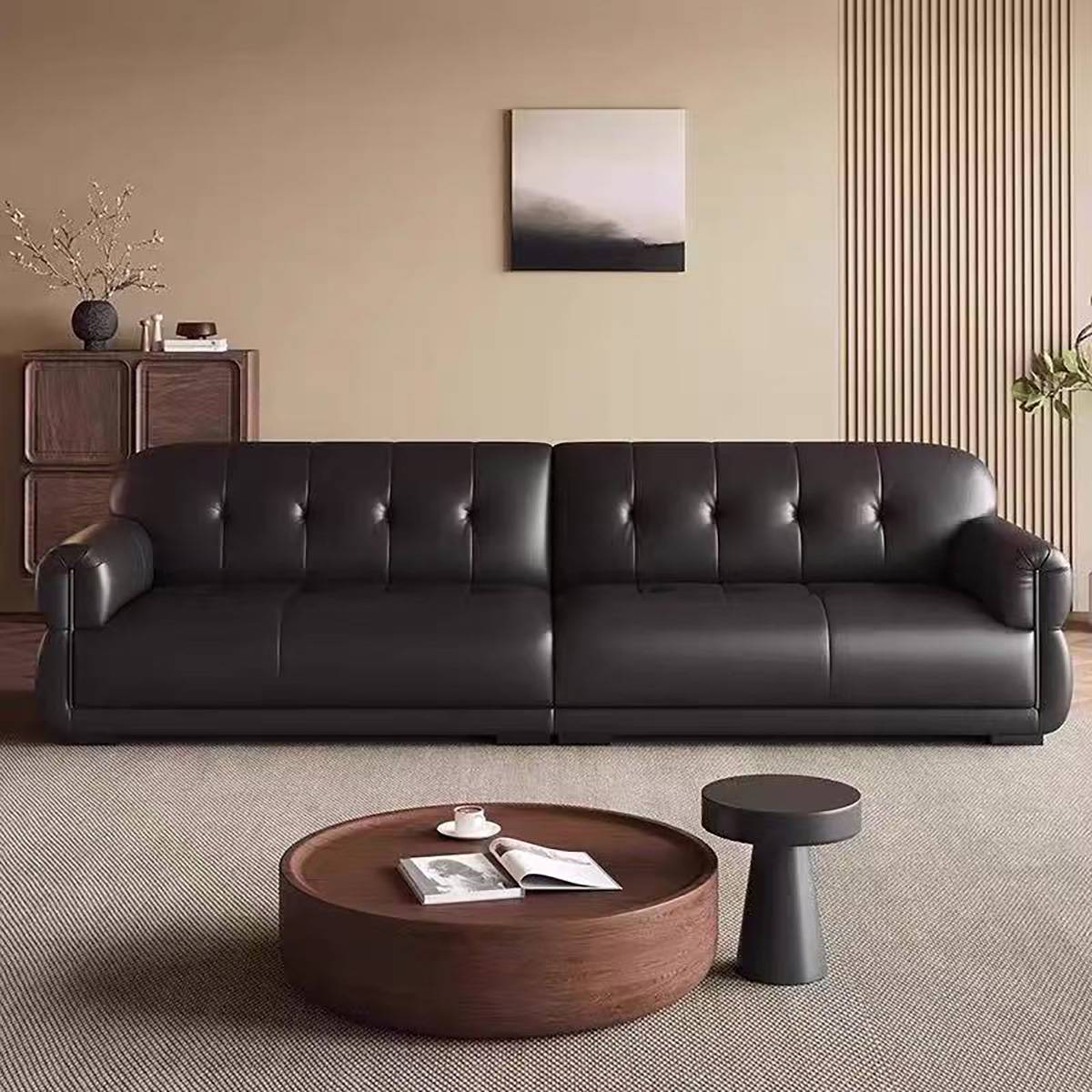 Black eco-leather straight sofa with tufted back in a living room setting