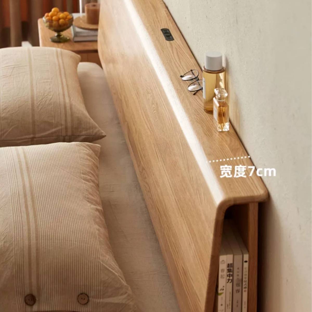 Side view of the headboard shelf displaying its 7cm width, holding glasses and perfume bottles, with a book storage compartment underneath.