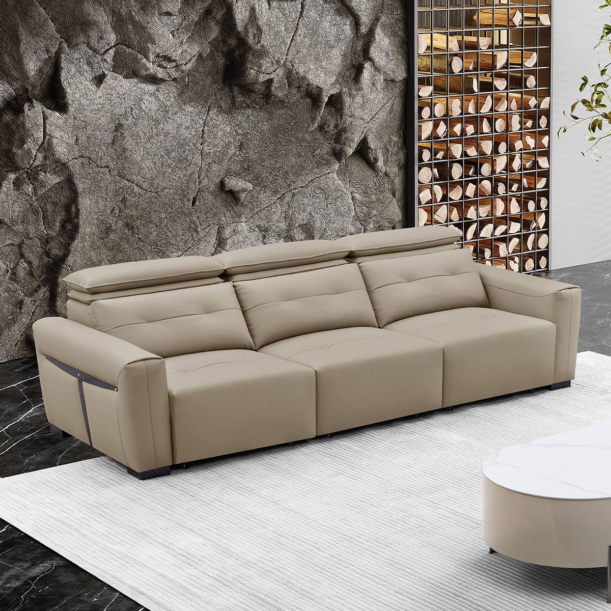 Sofa placed in a modern living room setting with stone wall background