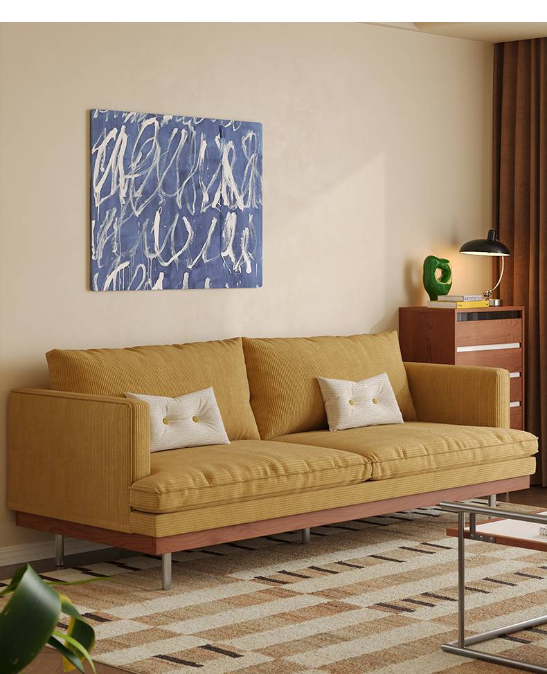 Yellow chenille sofa with white cushions