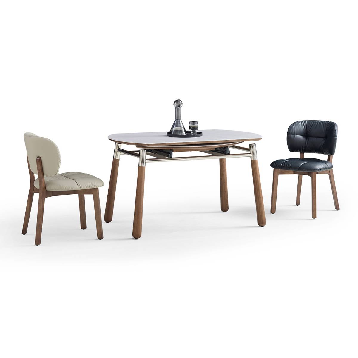 Lifestyle shot of the extended rectangular table accompanied by two dining chairs.