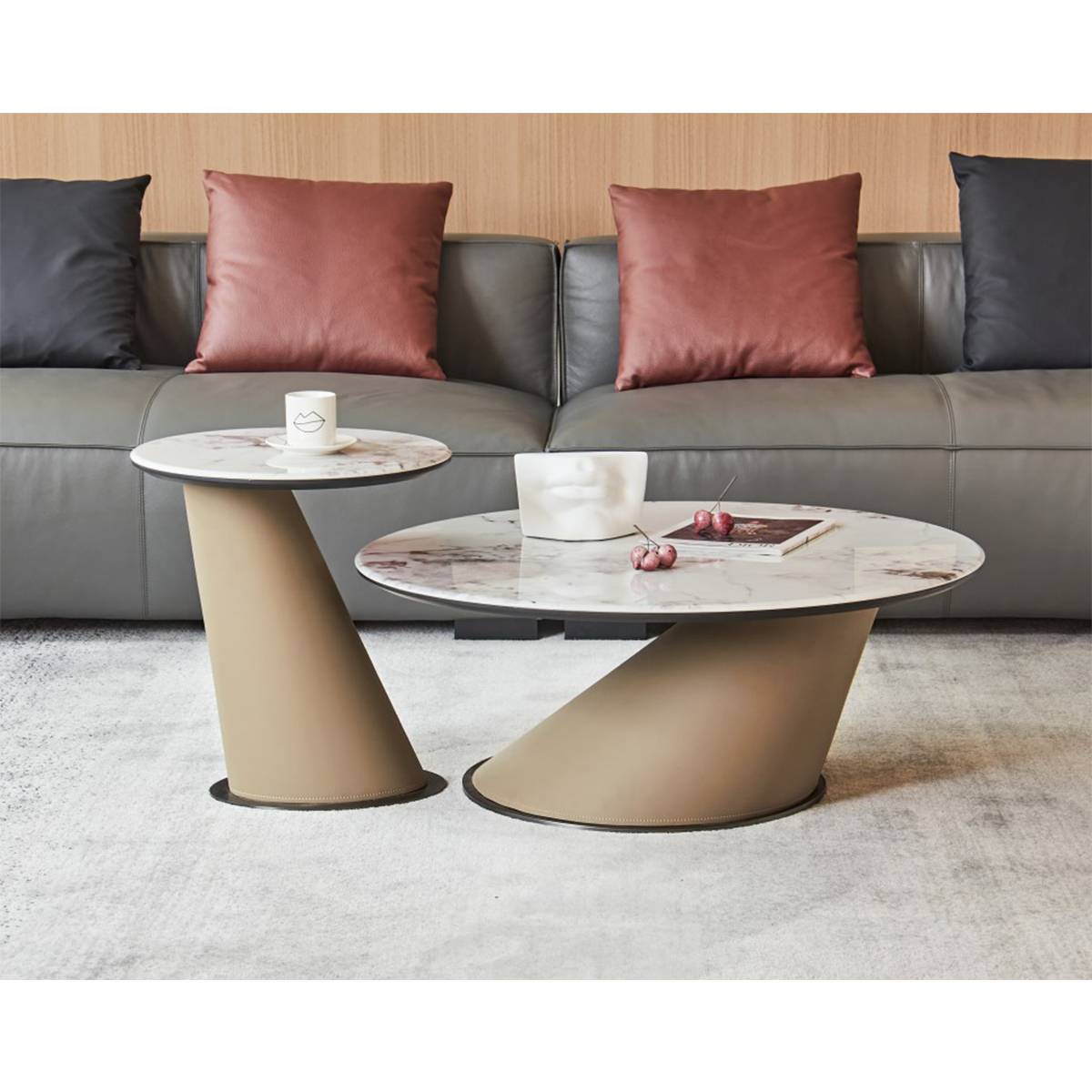 Front view of the B10 round coffee table showing the Pandora Purple stone surface and sculptural base.