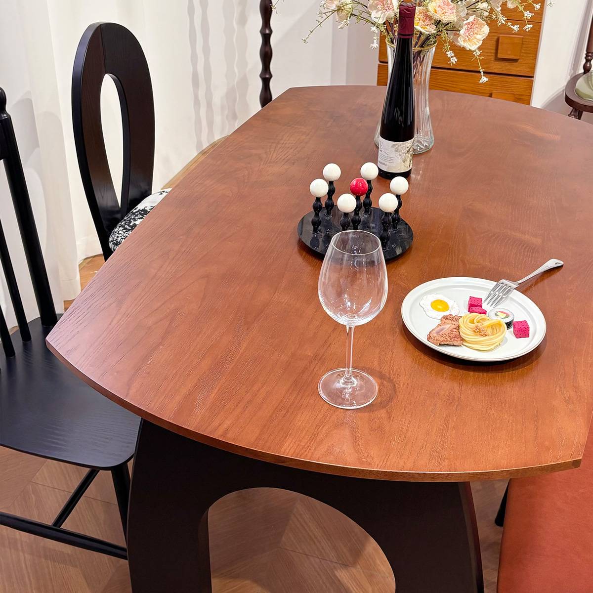 Close up of the table surface with wine glass and plate