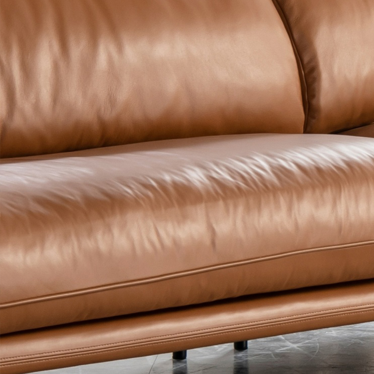 Close-up of the leather texture and seat cushion