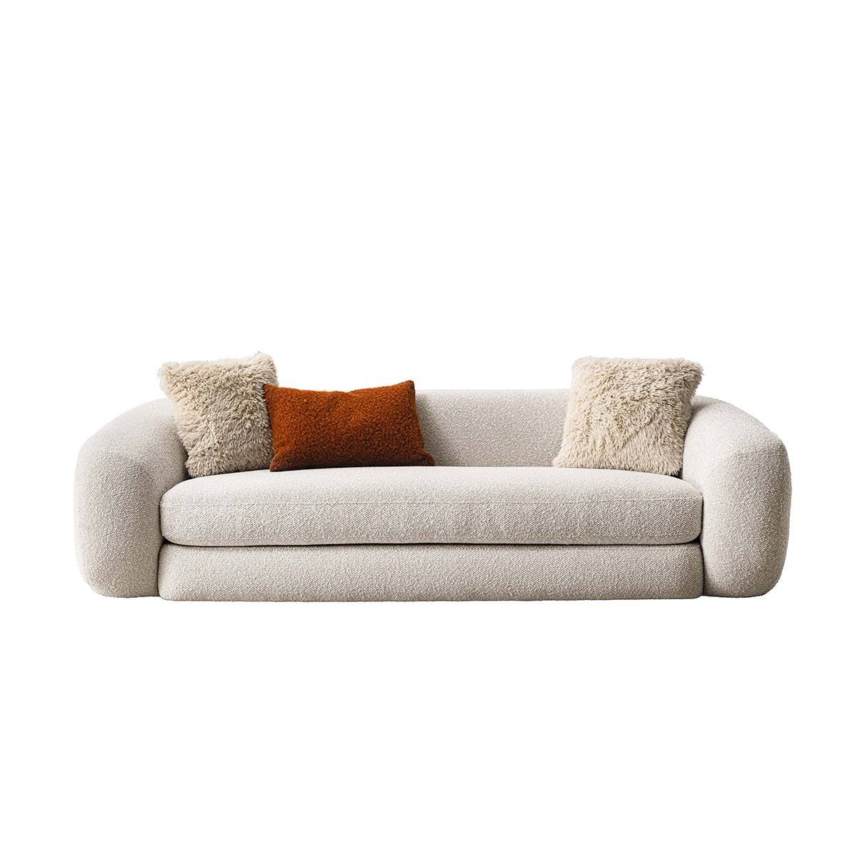Front view of the Balaka beige fabric sofa with throw pillows