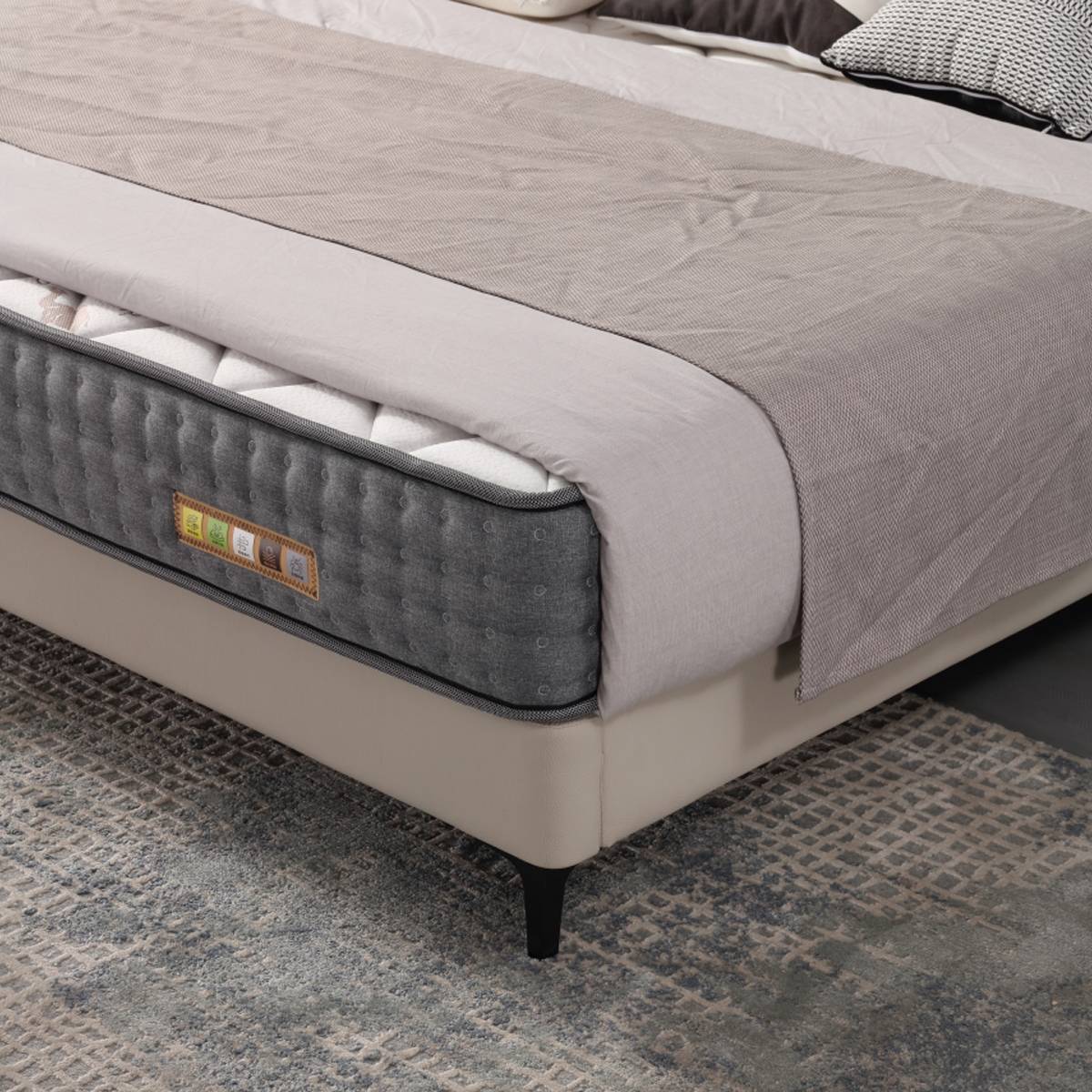Close-up of the tufted leather headboard texture