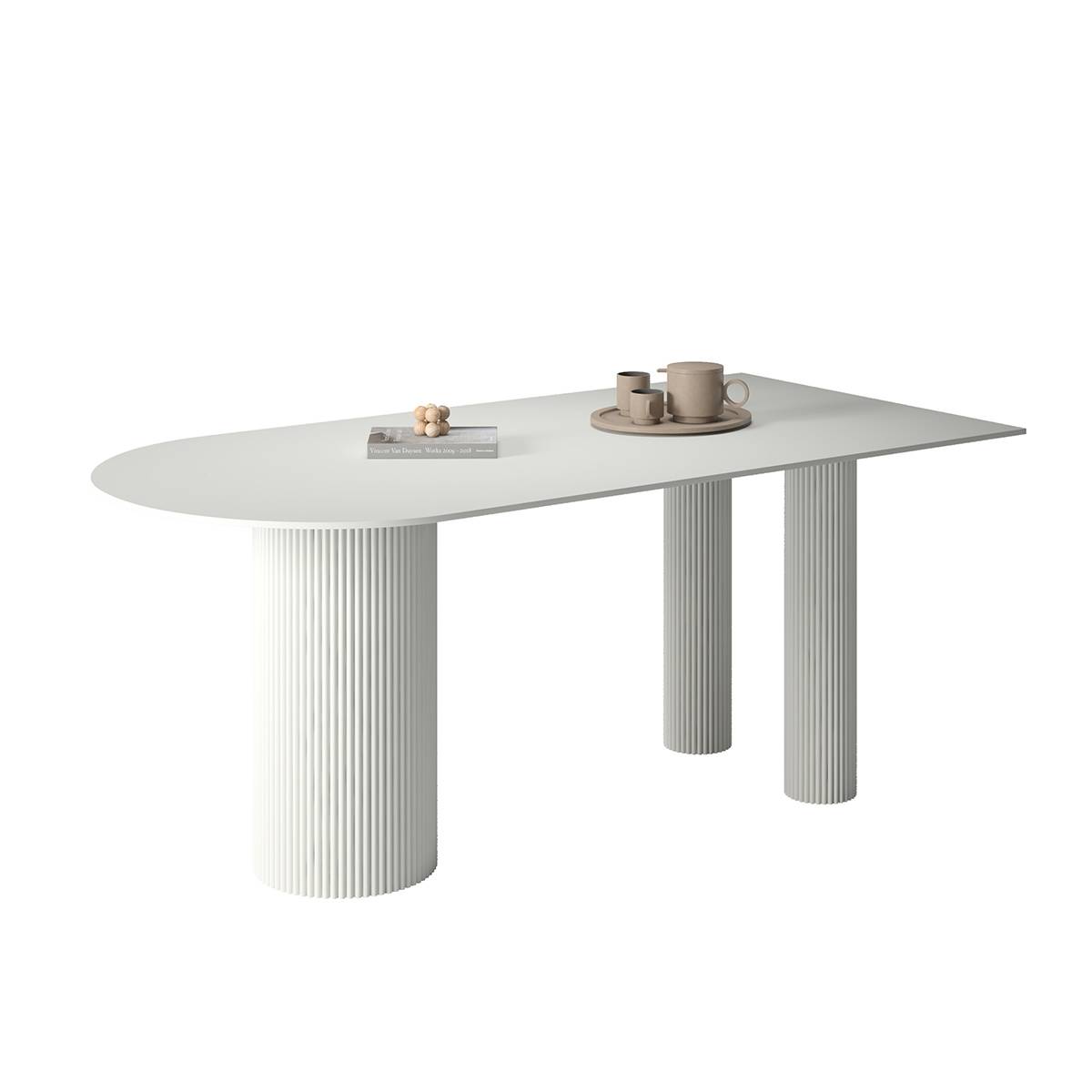 White oval dining table with fluted legs and coffee set
