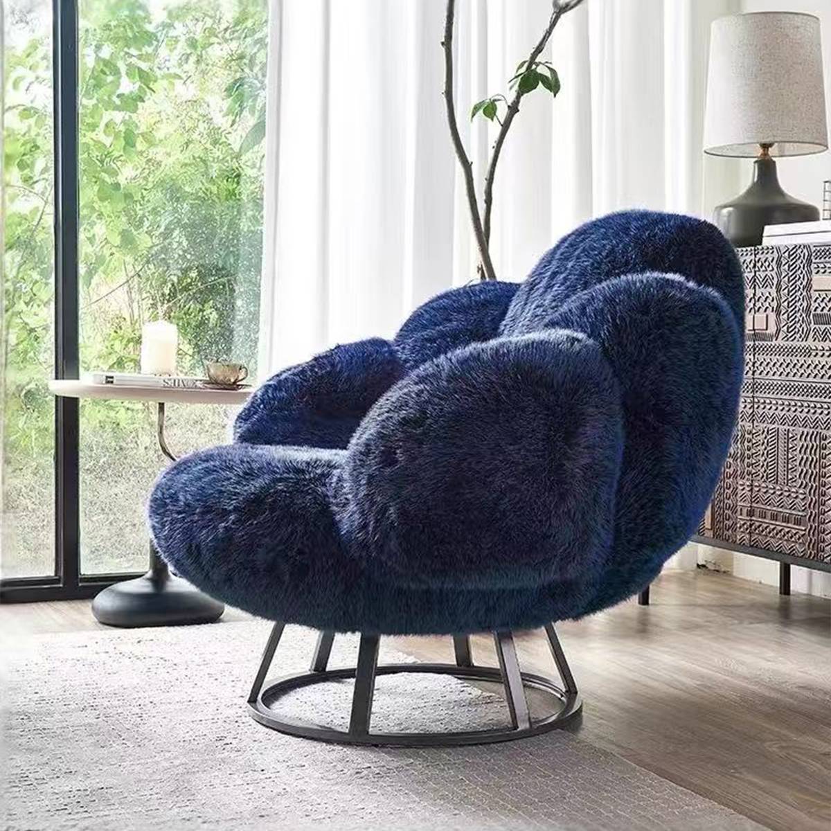 Blue Bear Paw Lounge Chair near a window
