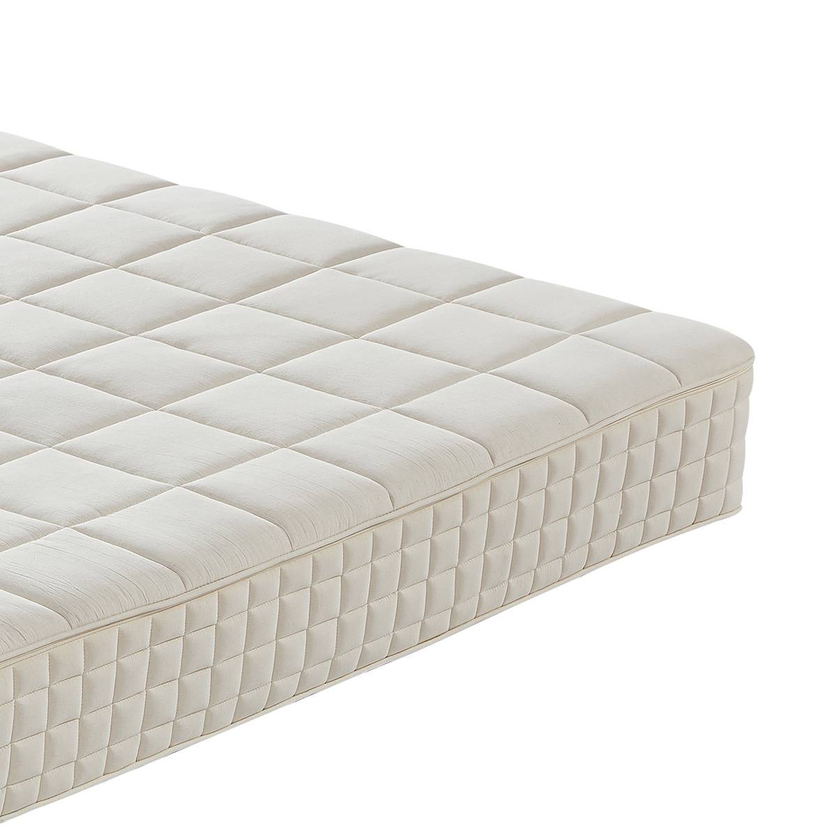 Side angle view of the mattress showing the quilted texture