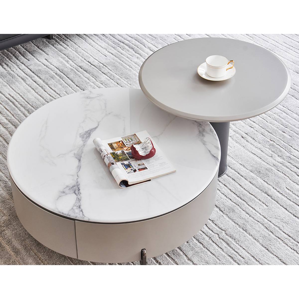 Top-down view of the coffee table set highlighting the marble texture and items on the table