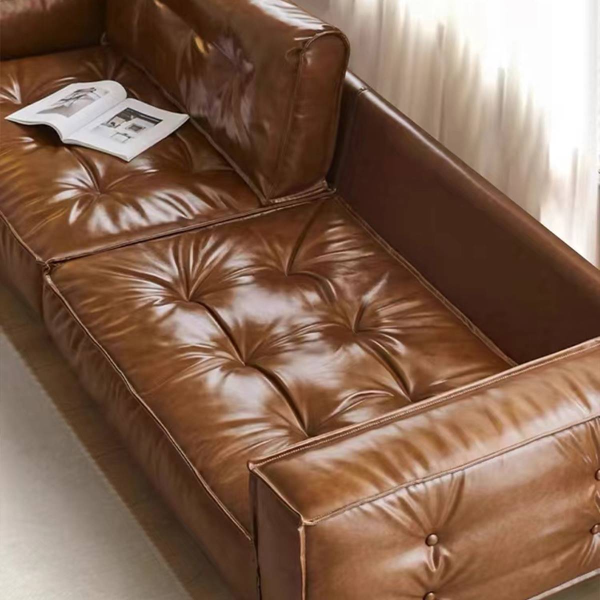 Detail shot of the tufted leather seat cushions