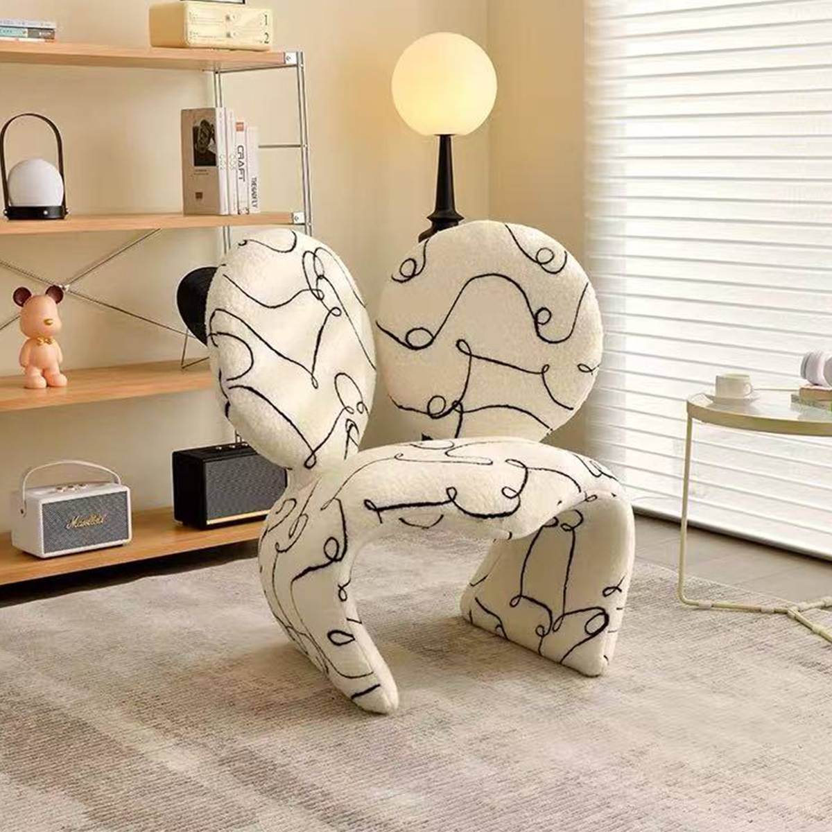 Side view of the white abstract line patterned Mickey leisure chair