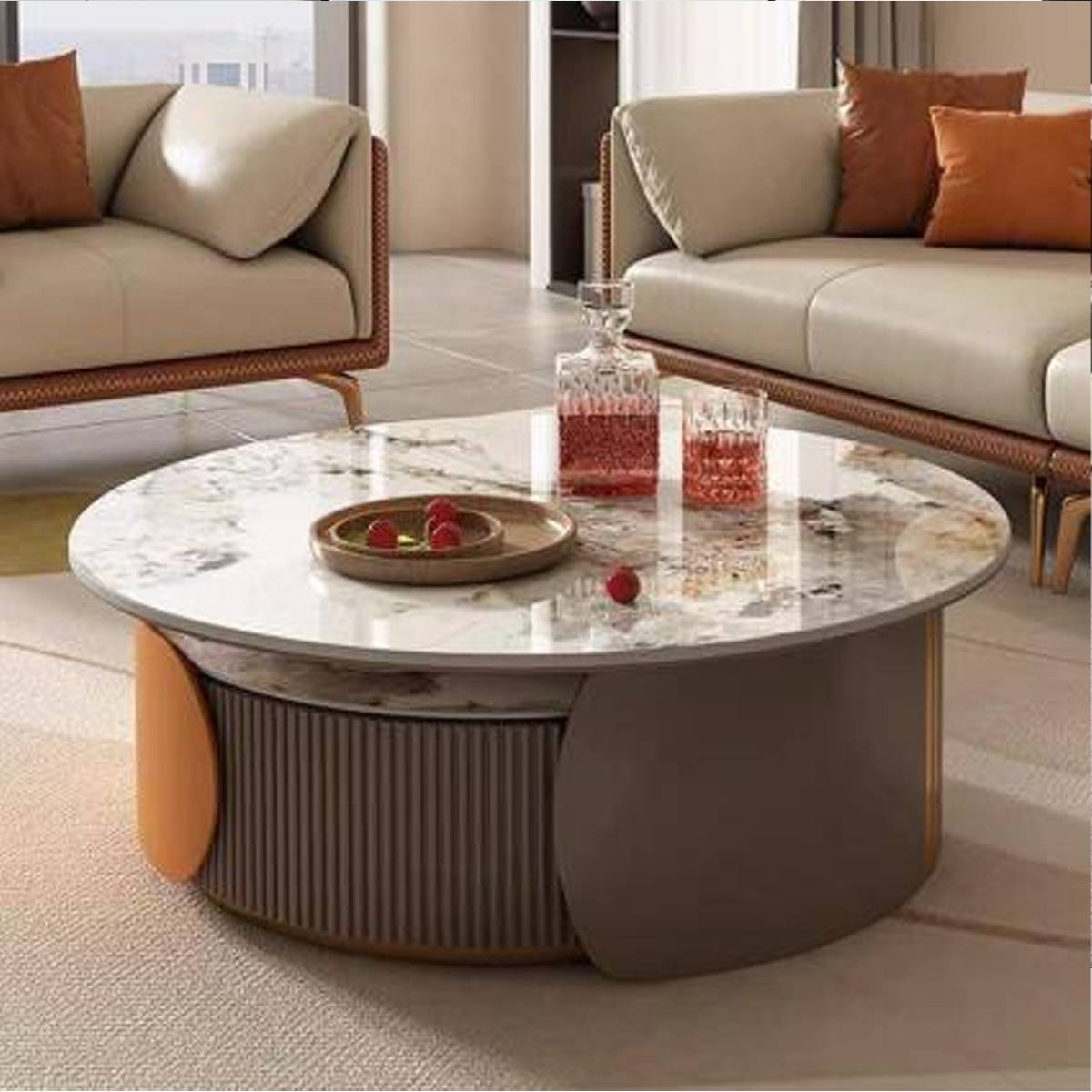 Close-up of the coffee tables with drinks and fruit on top, showing the marble texture