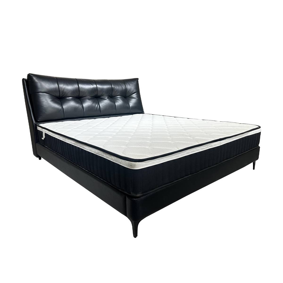 Black leather bed frame with mattress showing quilted top