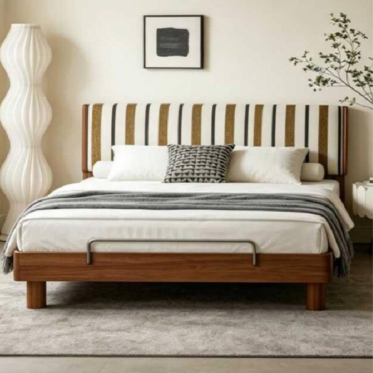 Front view of the bed showing the metal handle detail on the footboard