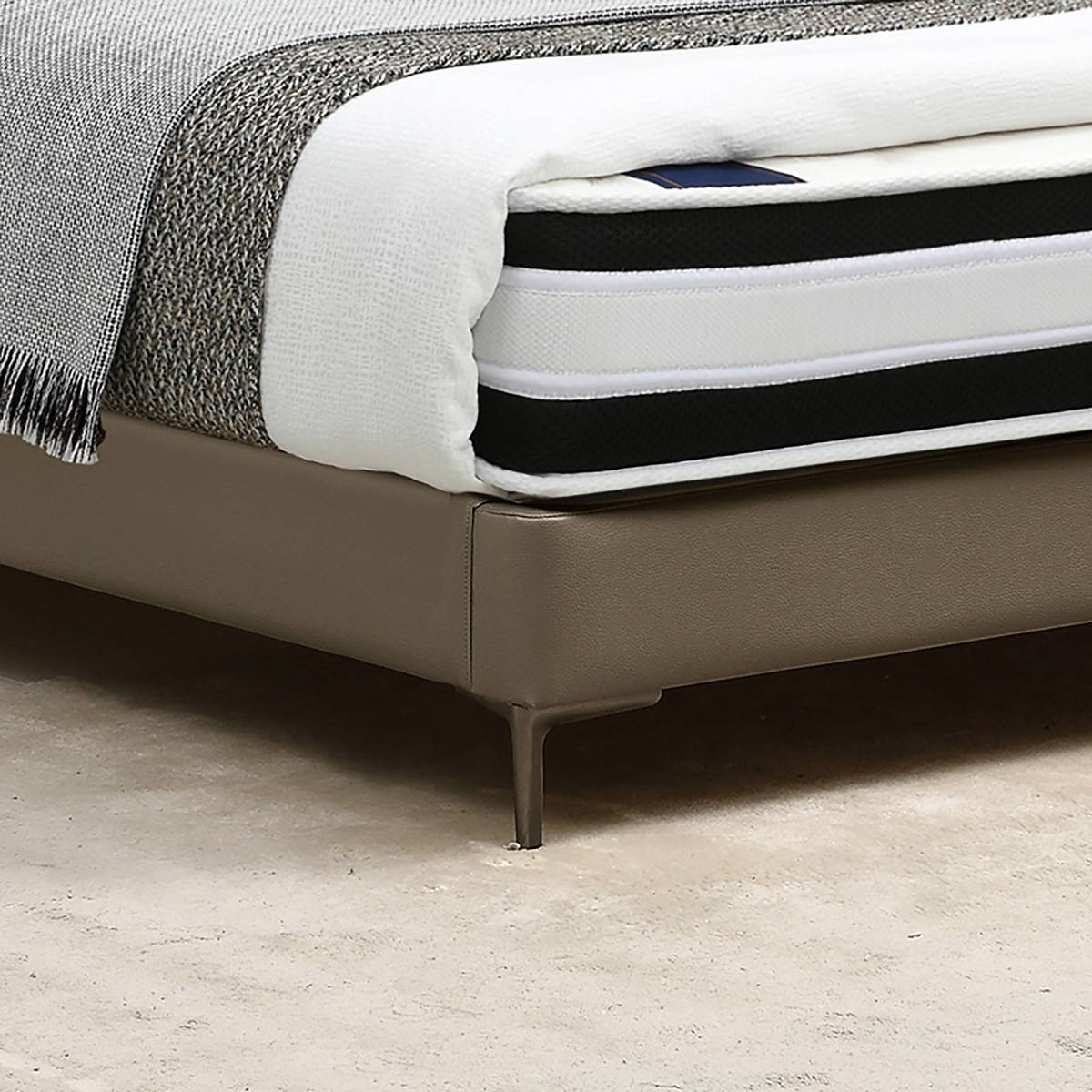 Detail shot of the bed frame base and metal leg