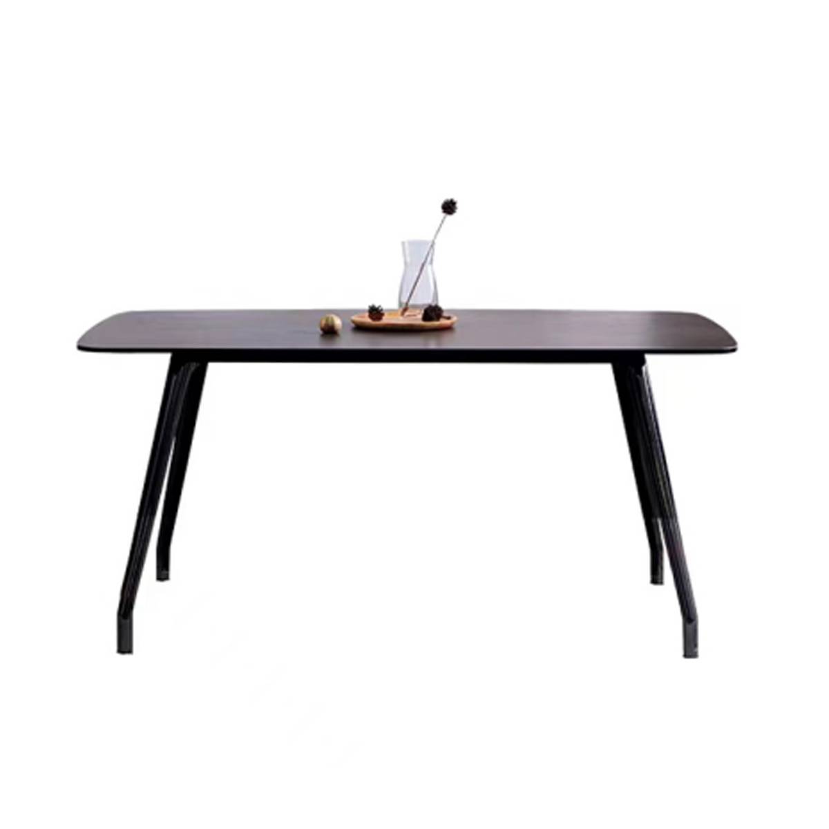 Product shot of the dining table with a dark wood or black marble top and black metal legs