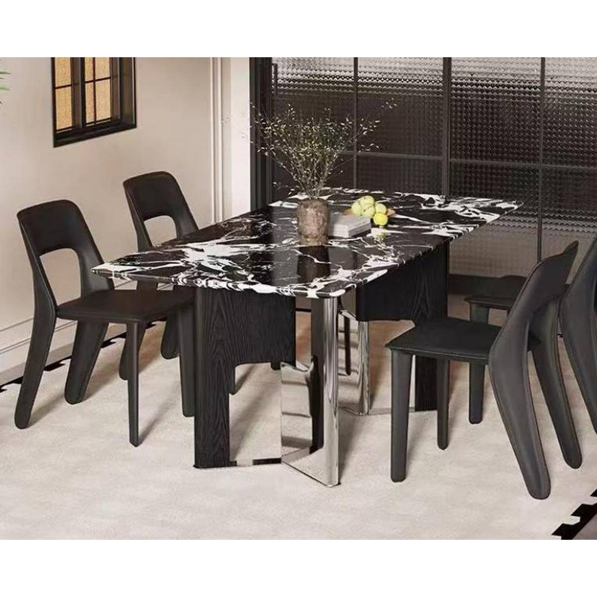 Side view of the Bulgari Black marble dining table showing the stainless steel and wood base