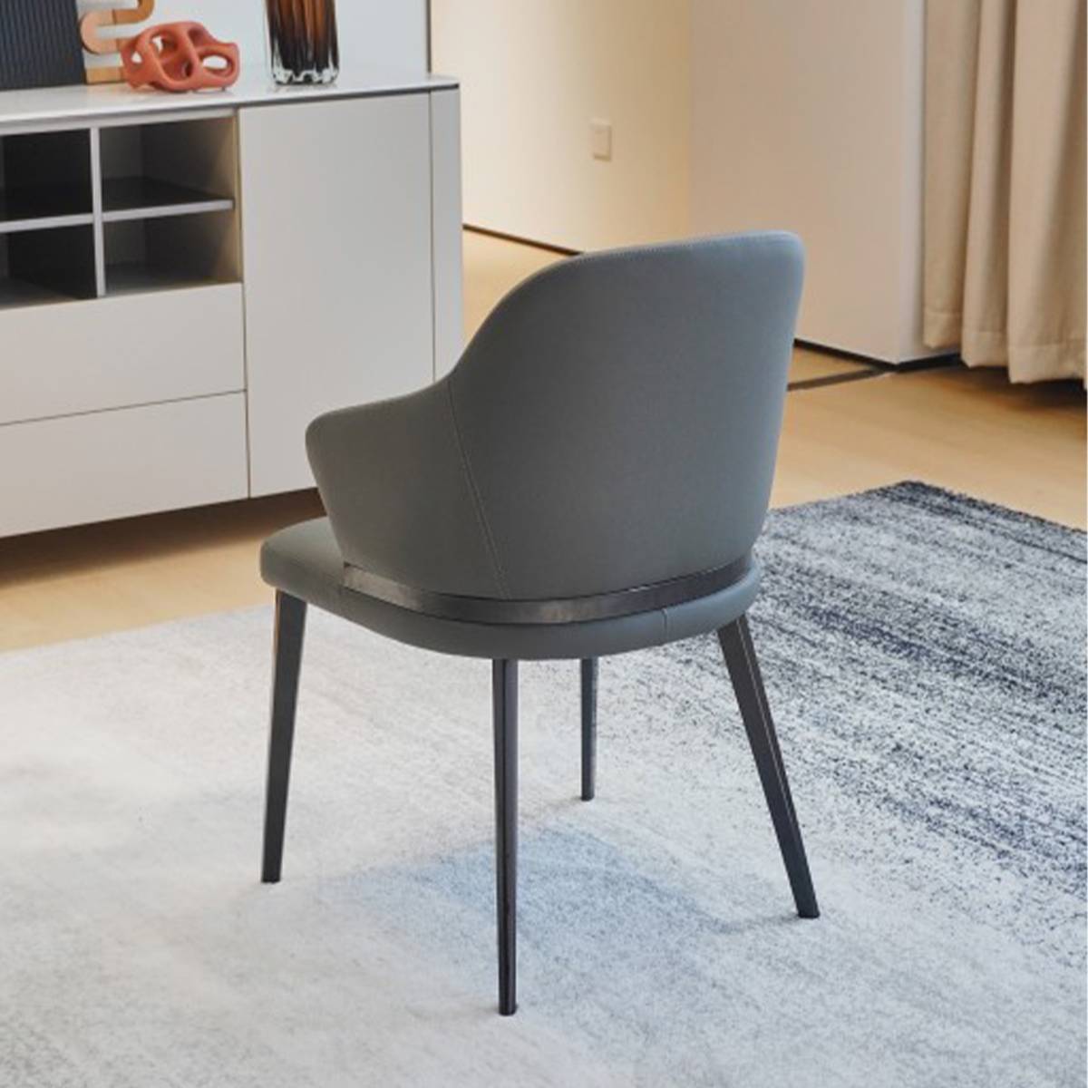 Rear view of deep grey dining chair