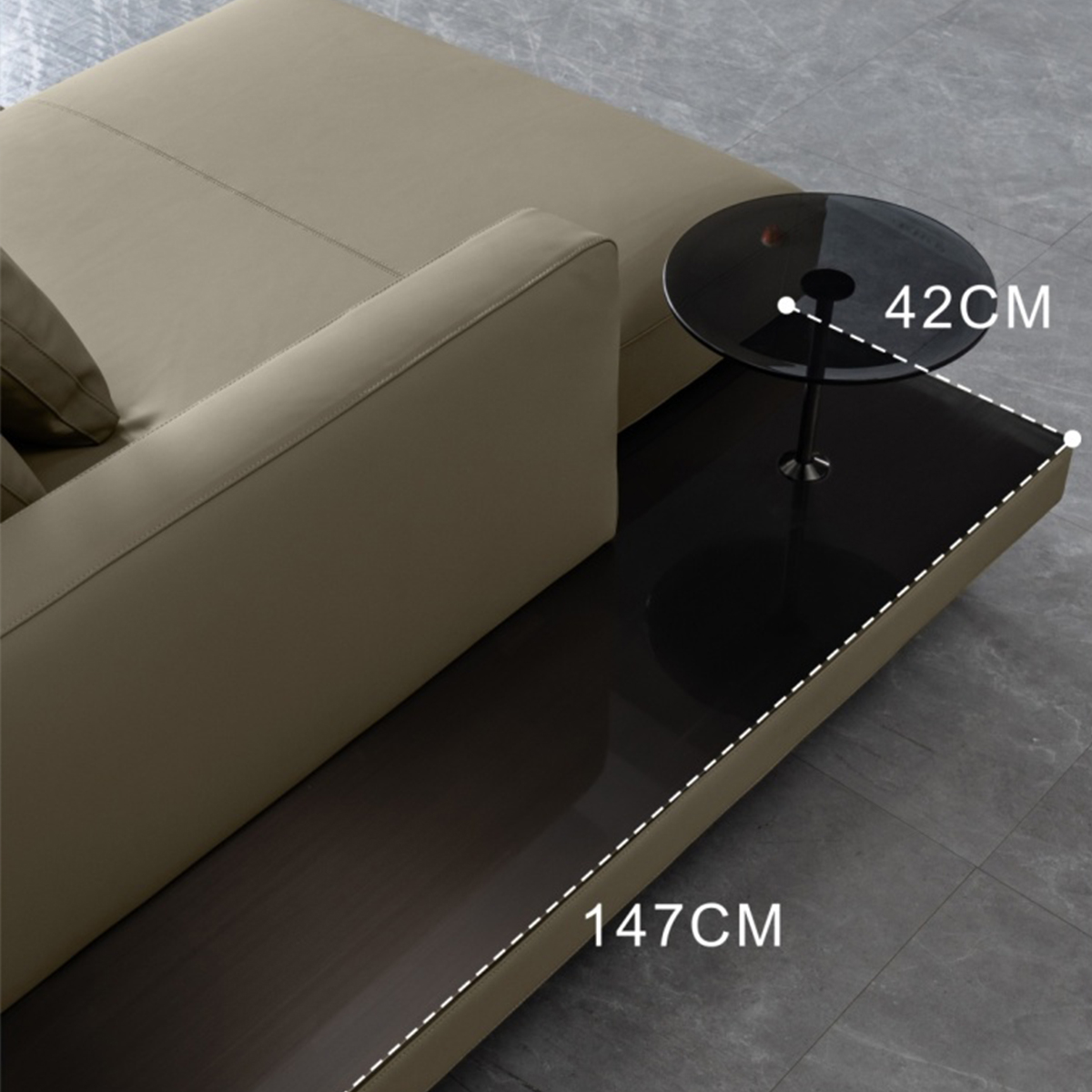Detail view of chaise section with side table and dimensions