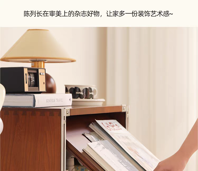Sideboard with flip-top door open displaying magazines