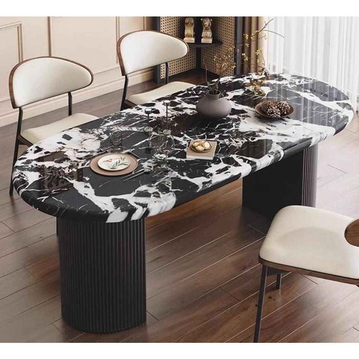 Oval dining table with black marble top and black fluted base