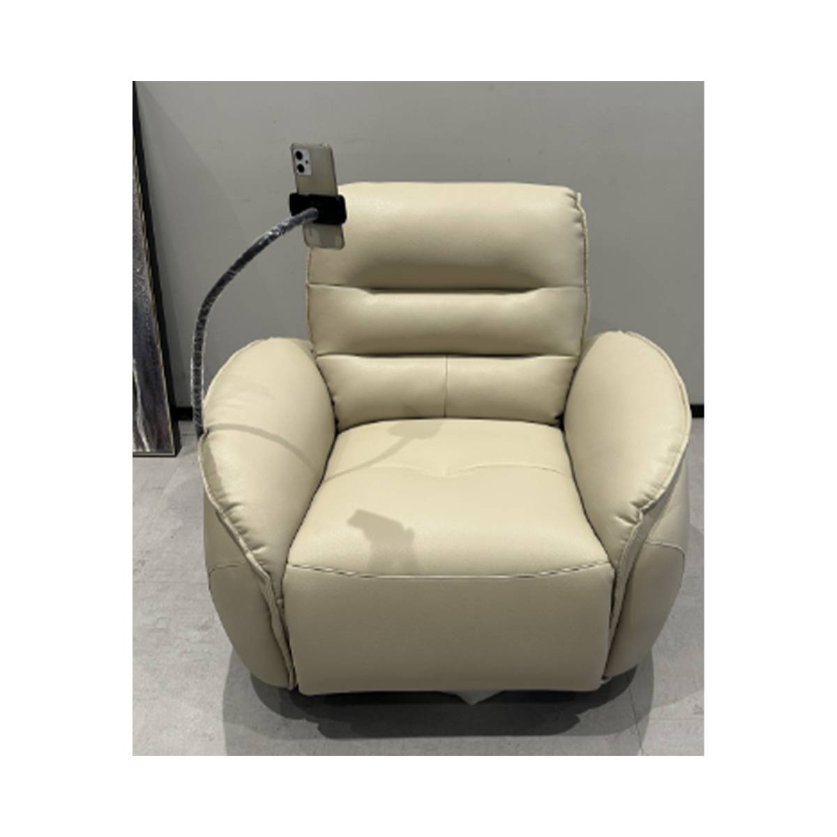 Front view of beige electric recliner chair in upright position with phone holder attachment