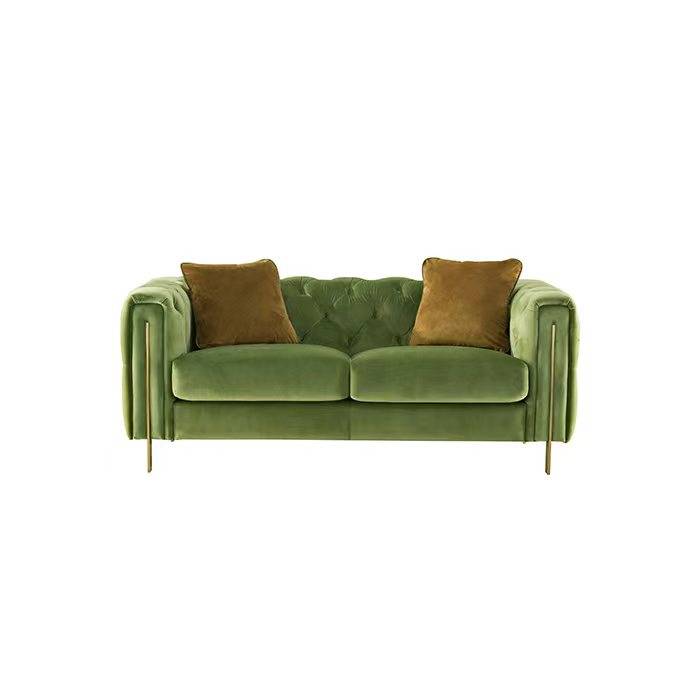 Green fabric sofa with brown cushions