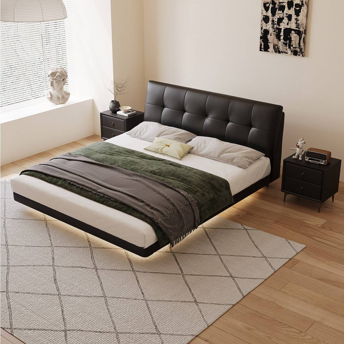 High-angle view of the floating bed with green throw blanket and bedside tables.