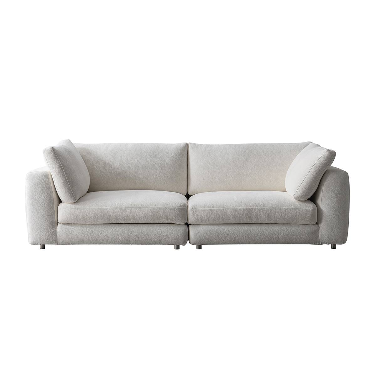 Front view of the white fabric sofa against a white background.