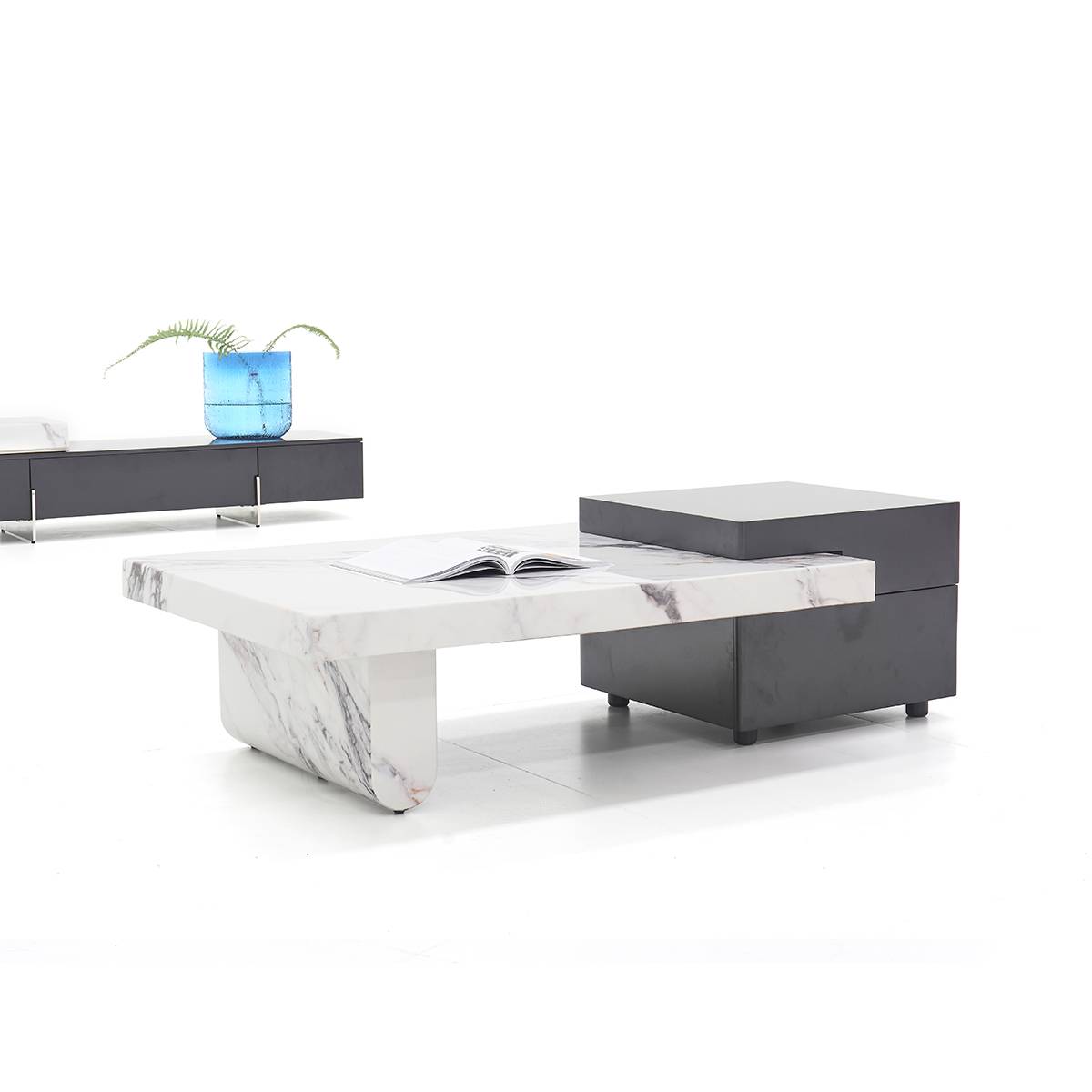 Coffee table in a living room setting with a sideboard in the background