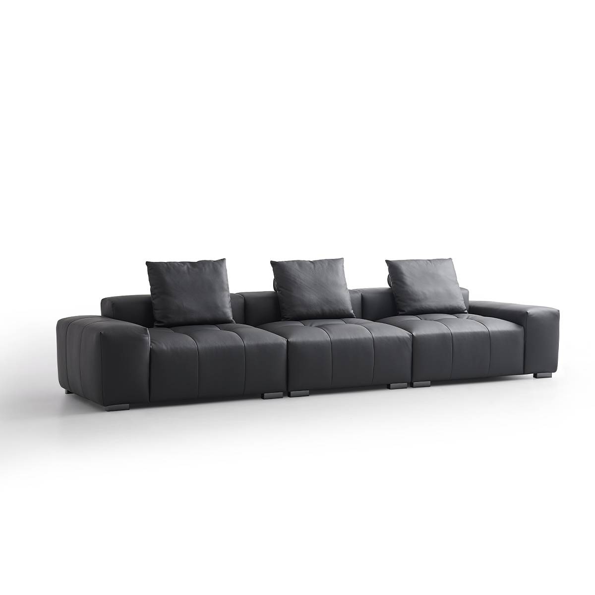Three-quarter view of the black leather sofa