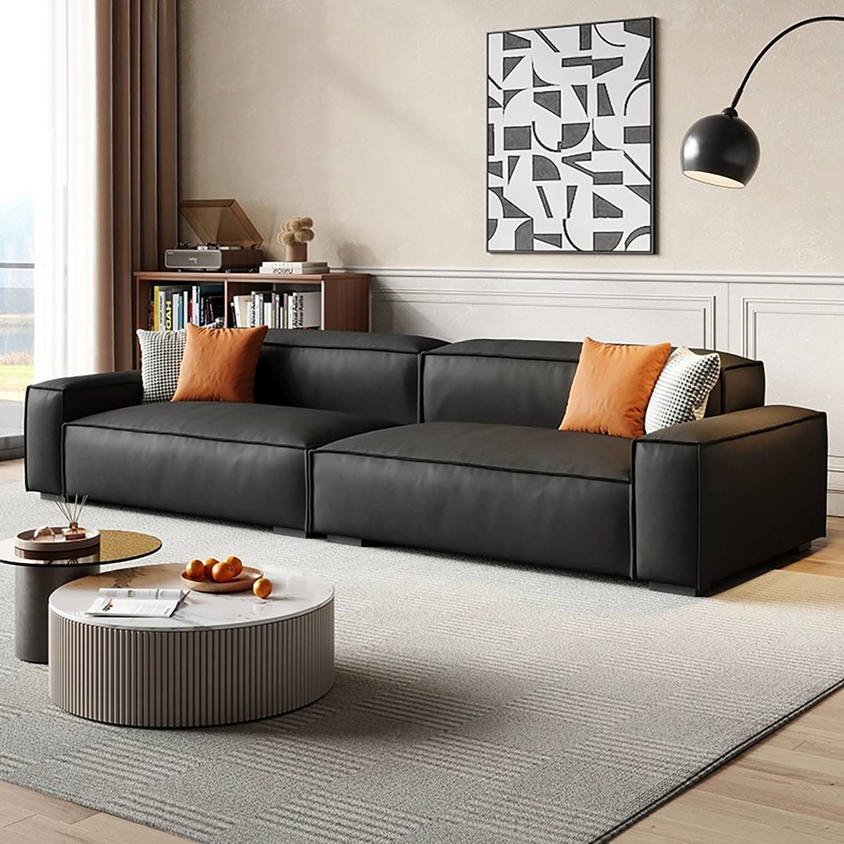 Black leather Tofu Block sofa with black and white checkered floor and marble coffee table