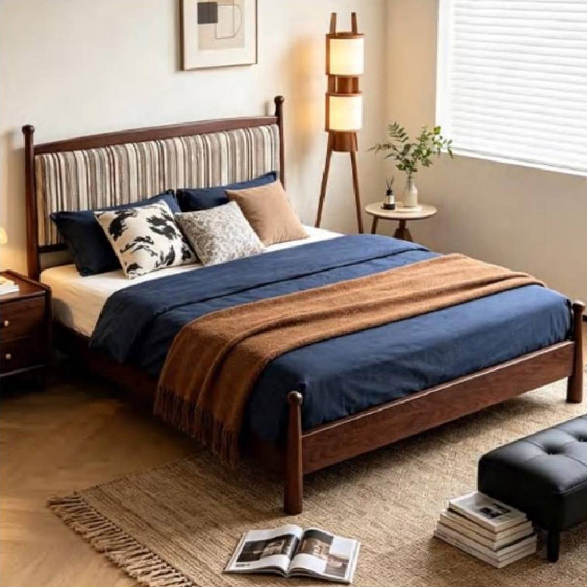 Side angle view of the bed showing the headboard and bedside table