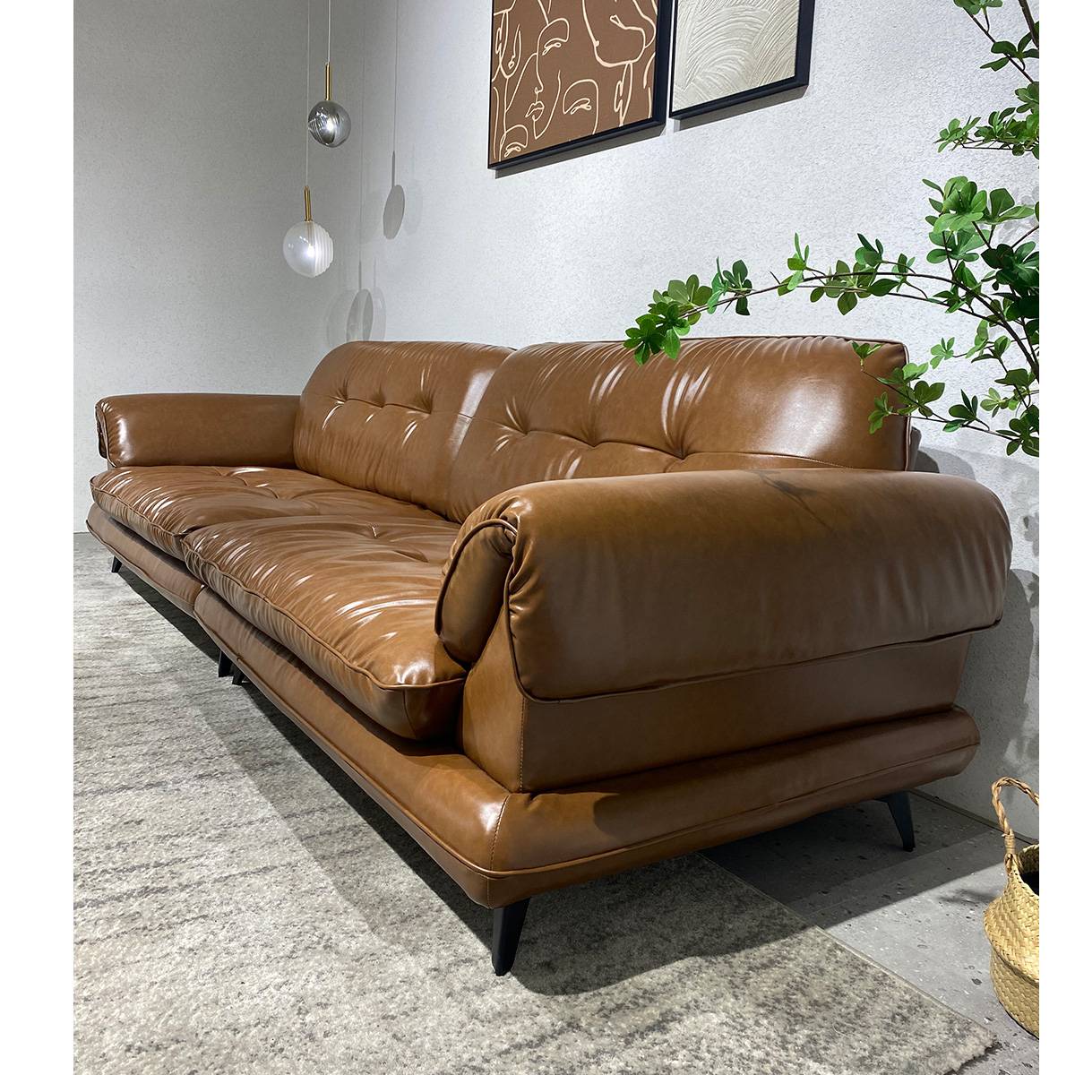 Brown leather mid-century modern straight sofa in a living room setting
