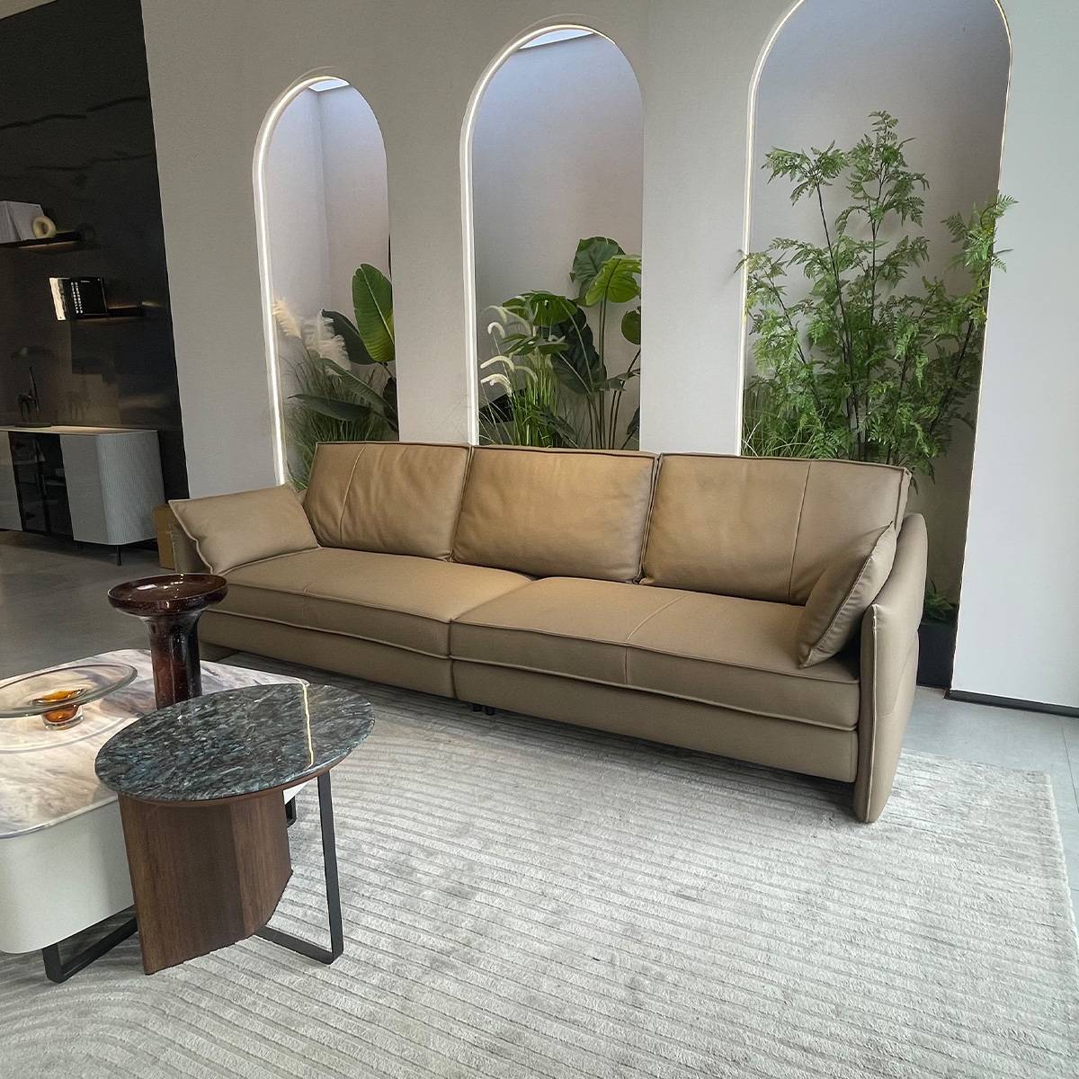 Angled view of the sofa showing the back cushions and armrests