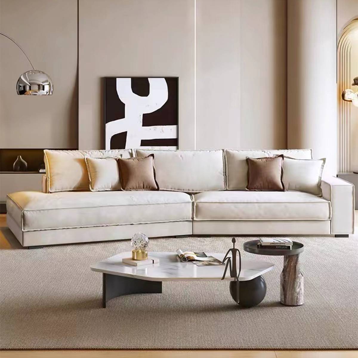 Front view of the Budapest fabric sofa in a modern living room setting with coffee table