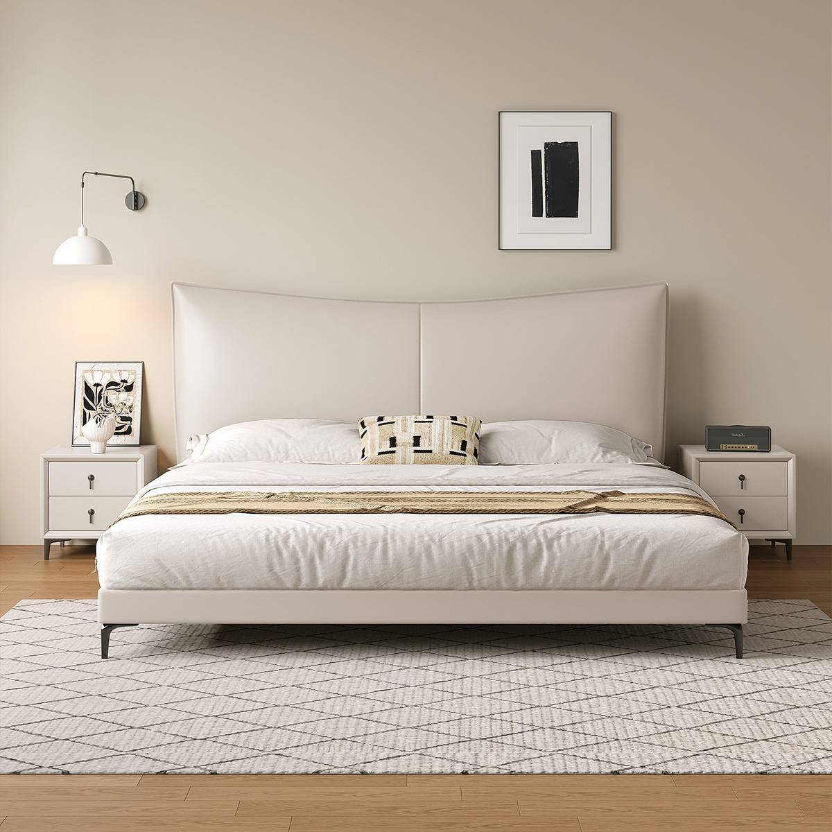 Front view of the white bed with matching bedside tables