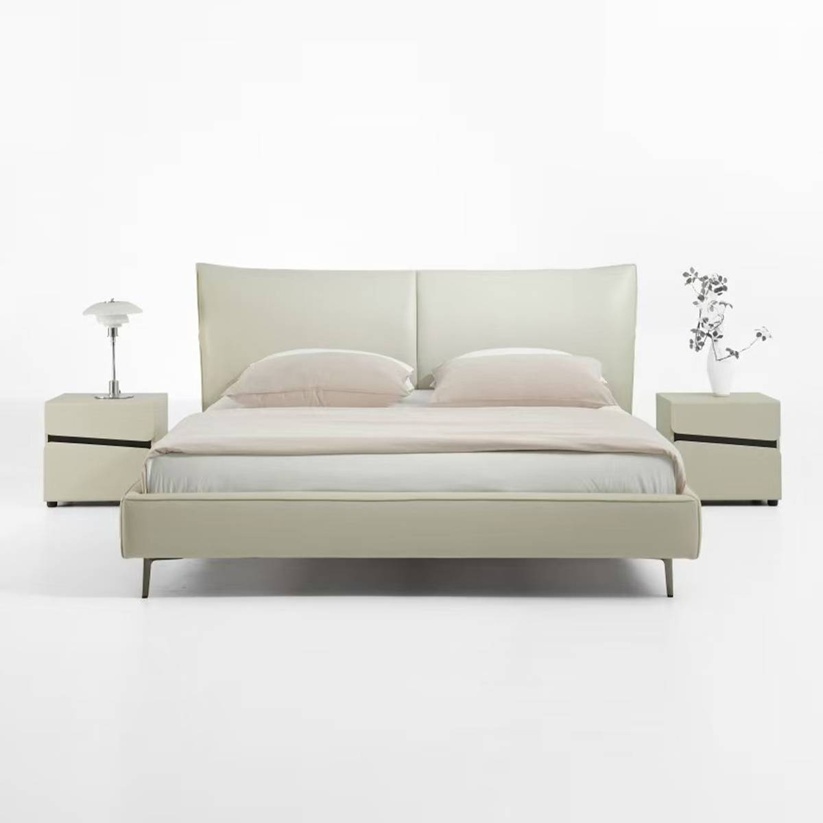 Front view of the semi-blue cowhide soft bed with matching bedside tables