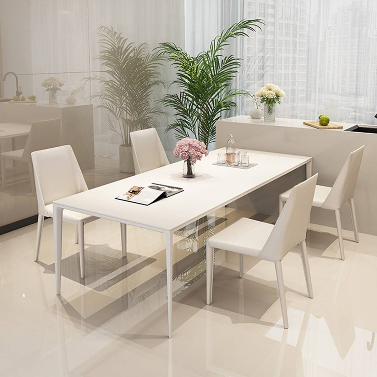 White dining table with straight legs and white chairs in a bright room