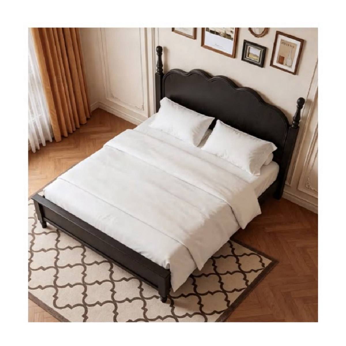 High-angle view of the bed showing the frame and rug