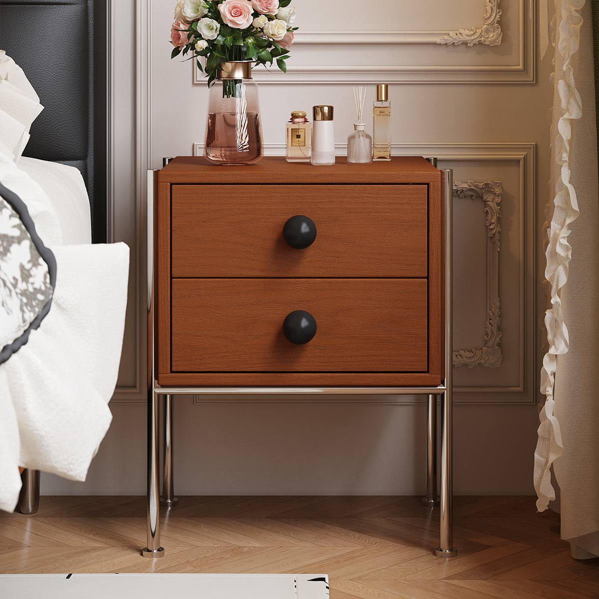 Front view of the bedside table highlighting the two drawers and metal legs.