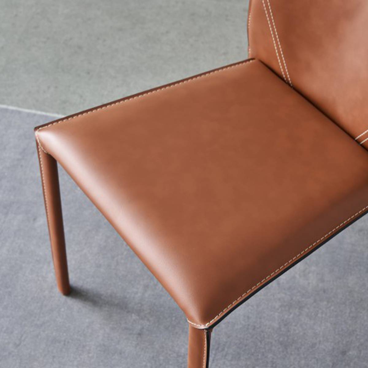 Close-up of the chair seat and leg connection